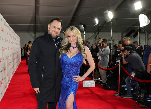 Stormy Daniels (right) and husband Barrett Blade attend the 2024 Adult Video News Awards in January. In a new interview, he talked about what the couple plans to do if Donald Trump is convicted or not.