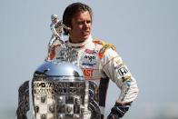 English racing driver Dan Wheldon, pictured in May 2011, was killed in a massive crash at the Las Vegas 300 IndyCar series finale on Sunday