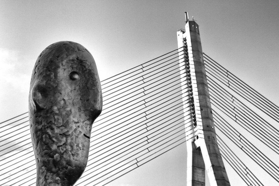<p>Riga’s ‘Tower Counter’ statue keeps watch over the city’s cable bridge. (Oleg Dashkov) </p>