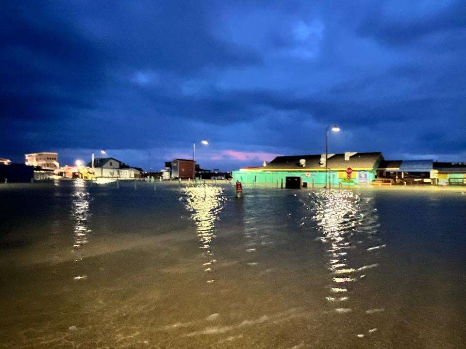 Flooding from Tropical Storm Idalia on Bay Street and the Fishy Fishy Cafe in Southport by Wednesday night.