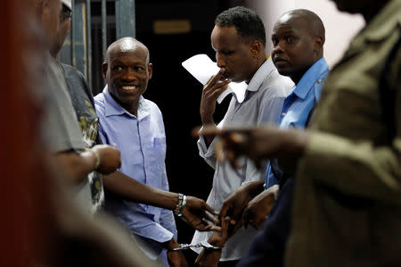 Joel Nganga and Guled Abdihakim are seen at the Mililani Law Courts where they appeared as suspects in connection with the attack at the DusitD2 complex, in Nairobi, Kenya January 18, 2019. REUTERS/Thomas Mukoya