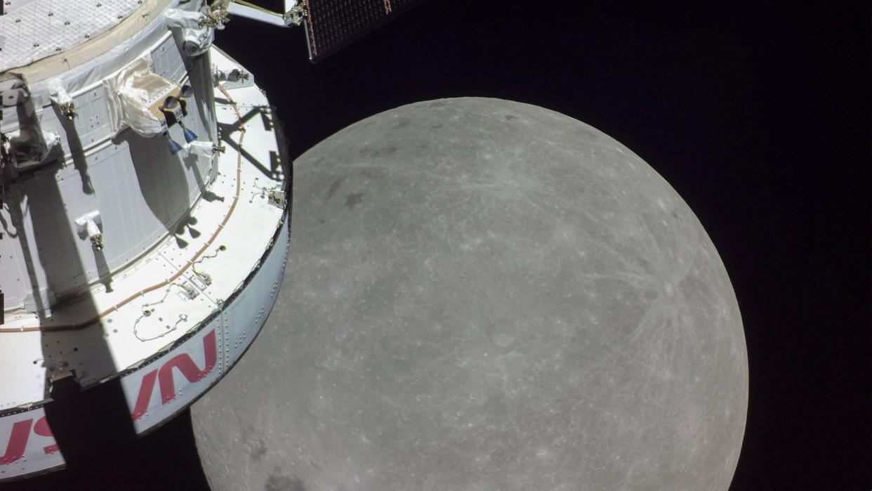  A portion of the far side of the Moon looms large just beyond the Orion spacecraft in this image taken on the sixth day of the Artemis I mission by a camera on the tip of one of Orion’s solar arrays. . 