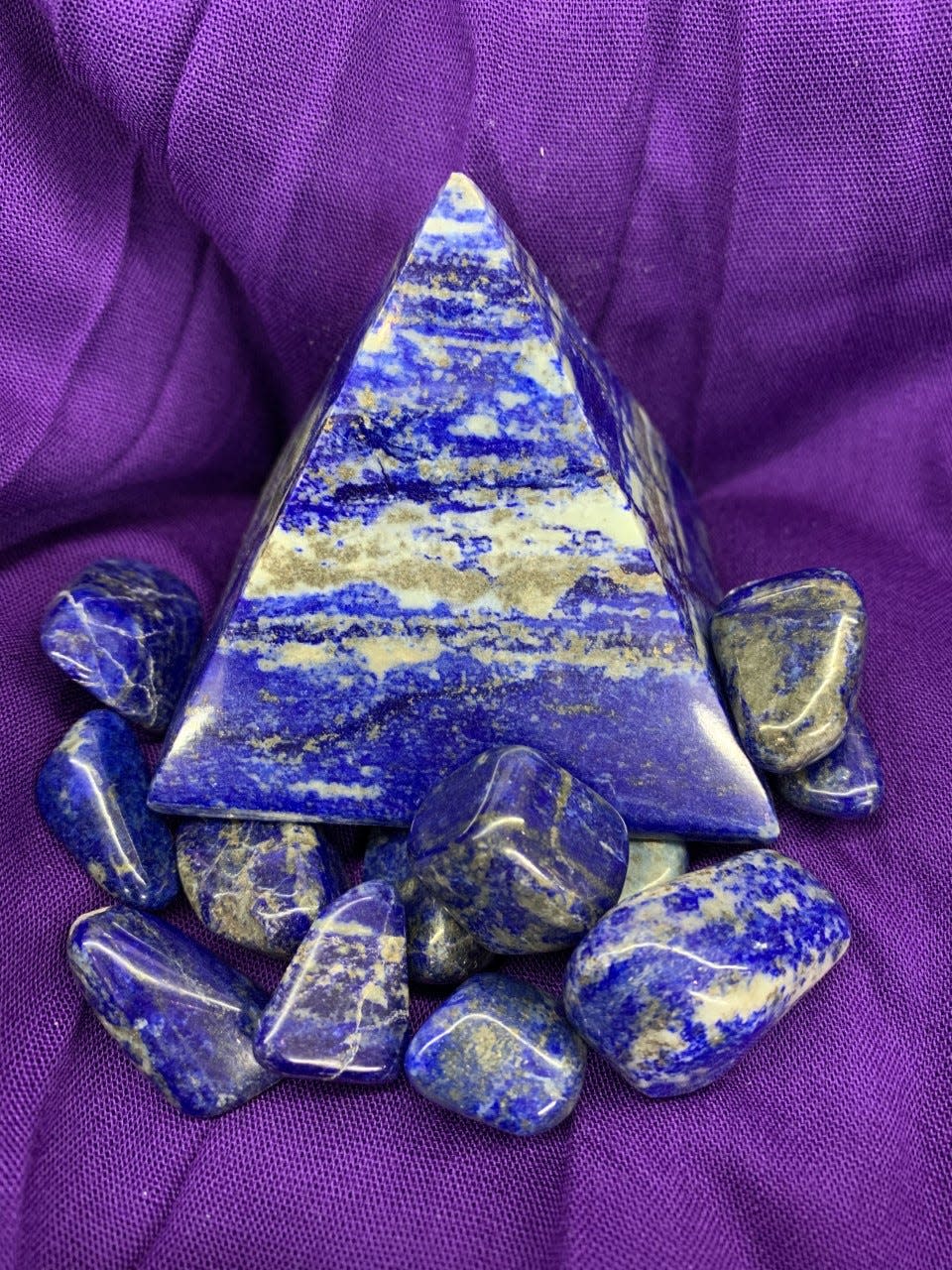 Lapis lazuli pyramid and stones. A center for metaphysical and spiritual study, Mount Shasta is home to crystal shops, some of which also sell singing bowls, musical instruments, jewelry and religious icons.