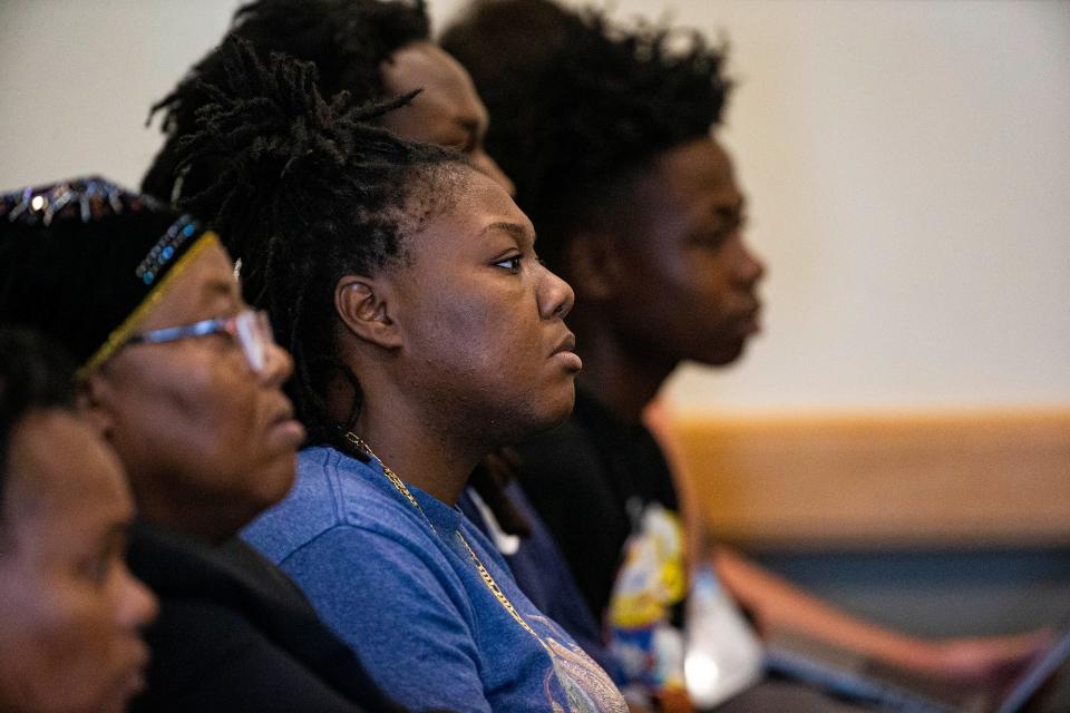 The family of Wisner Desmaret listens as the jury recommends life in prison in the murder of Fort Myers police officer Adam Jobbers-Miller on Friday.