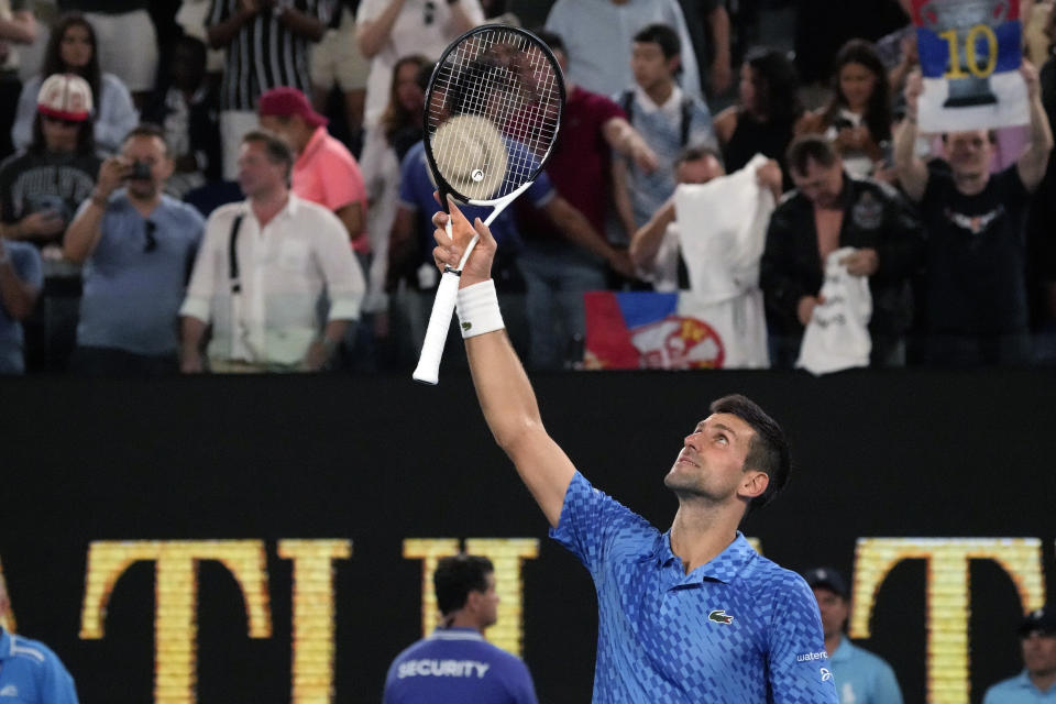 Novak Djokovic of Serbia celebrates after defeating Tommy Paul of the U.S. in their semifinal at the Australian Open tennis championship in Melbourne, Australia, Friday, Jan. 27, 2023. (AP Photo/Aaron Favila)