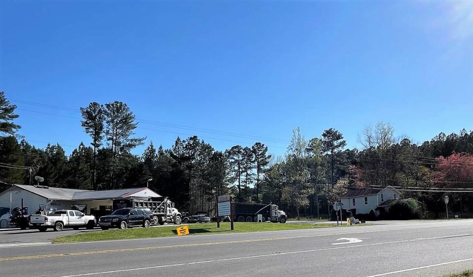 A developer wants to build a Dollar General store where this two-story former country store stands at the corner of White Cross Road and N.C. 54 in southern Orange County. Residents and local businesses are fighting the proposed rezoning.