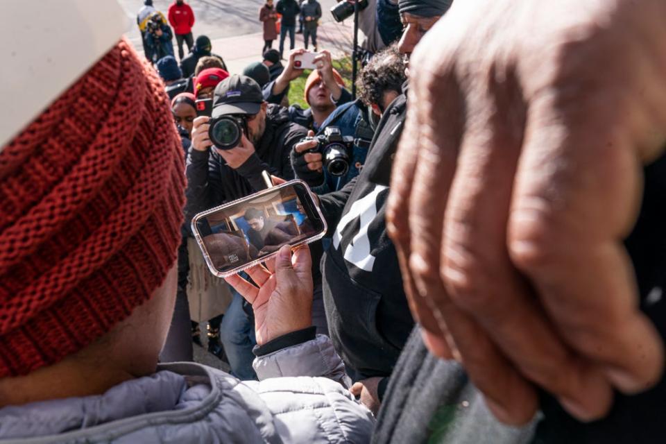 Activists in favor of a conviction watch as a not guilt verdict is read in the trial of Kyle Rittenhouse in front of the Kenosha County Courthouse on November 19, 2021 in Kenosha, Wisconsin (Getty Images)