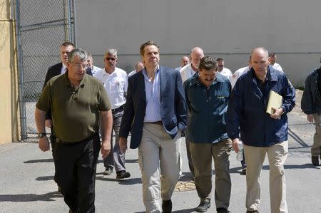 New York Governor Andrew M. Cuomo (2nd L) tours the Clinton Correctional Facility with prison Superintendent Steven Racette (L), Acting Department of Corrections and Community Supervision Commissioner Anthony J. Annucci and Deputy Commissioner for Facility Operations Joseph Bellnier (R) in Dannemora, New York in a photo released by the New York State Office of the Governor June 6, 2015. REUTERS/New York State Office of the Governor/Darren McGee/Handout via Reuters