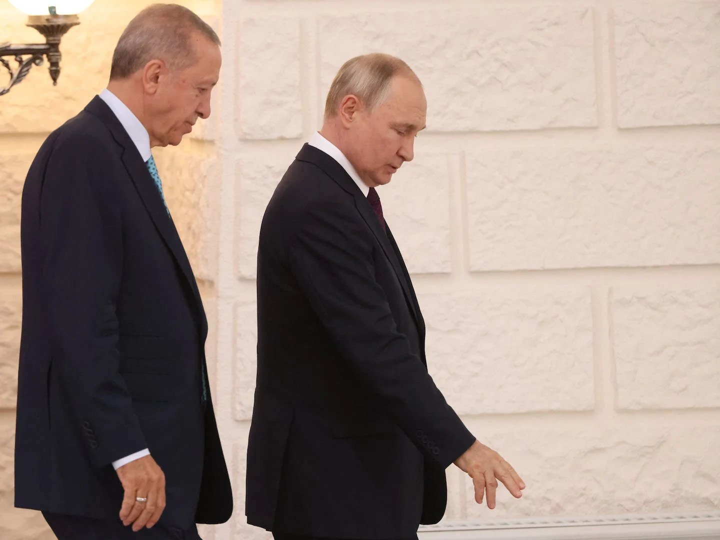 Russian President Vladimir Putin, right, walks with Turkish President Recep Tayyip Erdogan. <a href="https://www.gettyimages.com/detail/news-photo/russian-president-vladimir-putin-shakes-hands-with-turkish-news-photo/1645160088?adppopup=true" rel="nofollow noopener" target="_blank" data-ylk="slk:Photo by Contributor/Getty Images;elm:context_link;itc:0" class="link ">Photo by Contributor/Getty Images</a>