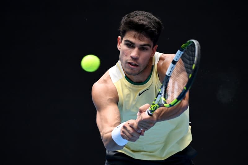Spanish tennis player Carlos Alcaraz in action against China's Juncheng Shang during their men's singles third round tennis match of the 2024 Australian Open at Melbourne Park. Joel Carrett/AAP/dpa
