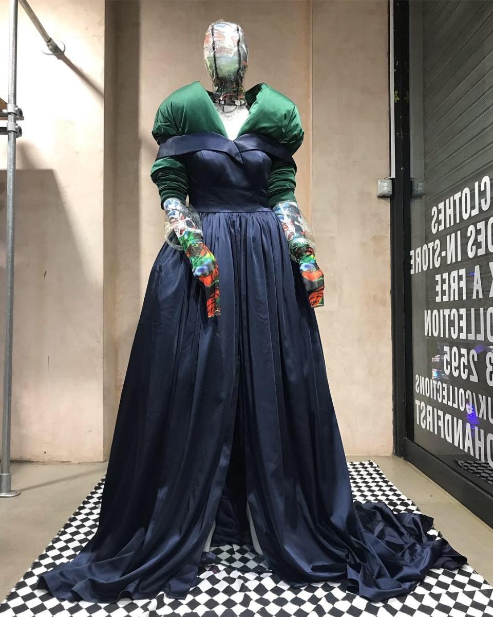 Francesco Colucci styles the windows of Traid by repurposing donated clothes and glitzy fabrics.