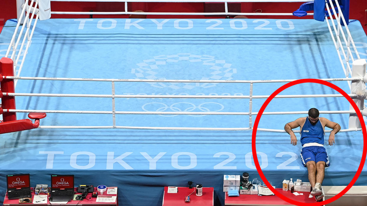 Pictured here, Frenchman Mourad Aliev stages a sit-in protest after his disqualification in the Olympic boxing.