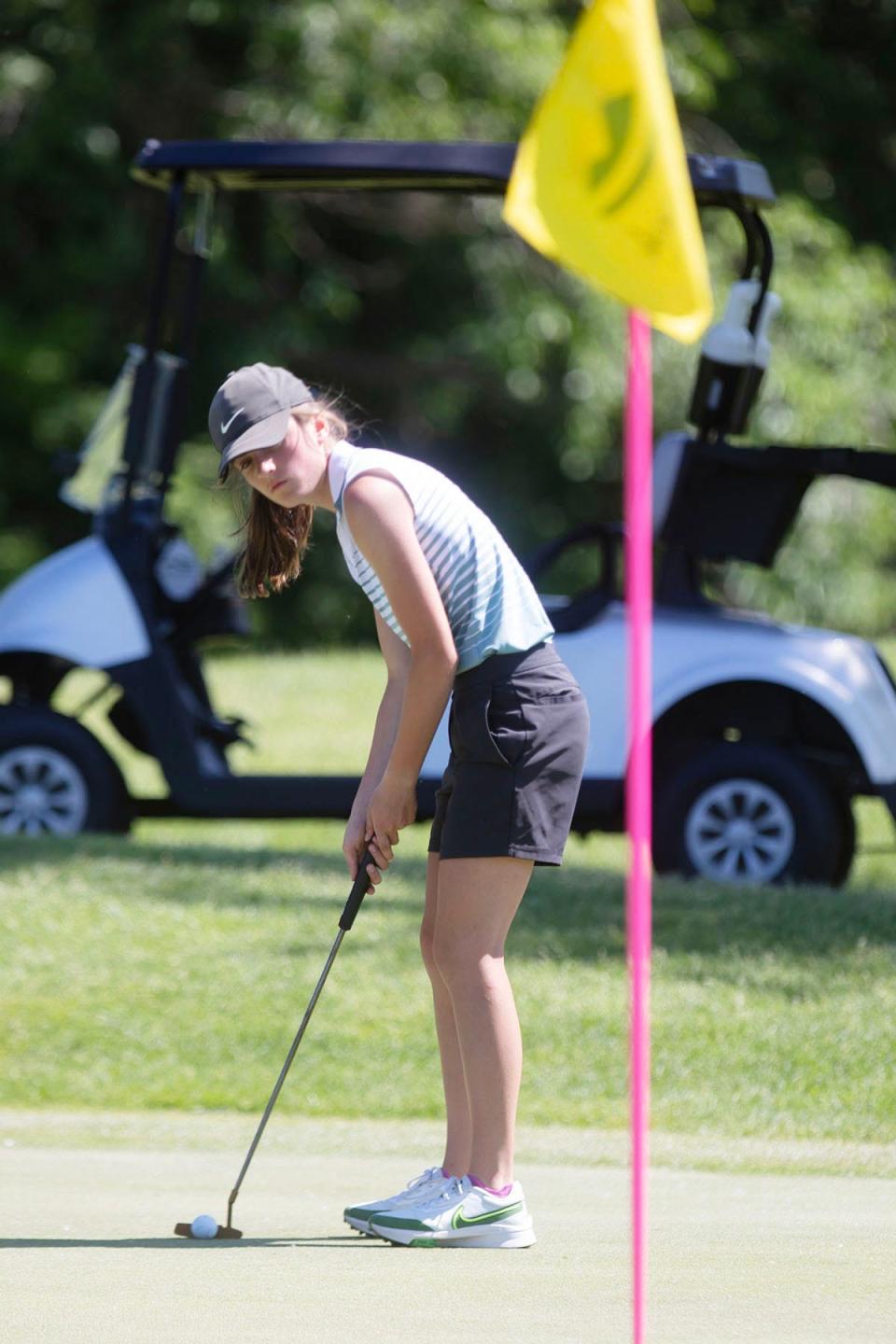 Claire Crawford of Aberdeen Roncalli lines up her putt on the 17th hole during the second day of the state Class A girls golf tournament on Tuesday, June 6, 2023 at the Meadowbrook Golf Course in Rapid City. Crawford finished fifth in the two-day tourney.