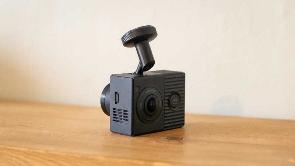 Garmin Dash Cam Tandem on a wooden surface