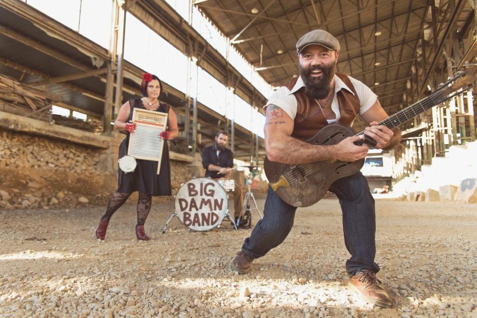 Reverend Peyton's Big Damn Band includes, from left, washboardist Breezy Peyton,  drummer Max Senteney and Reverend Peyton on guitar.