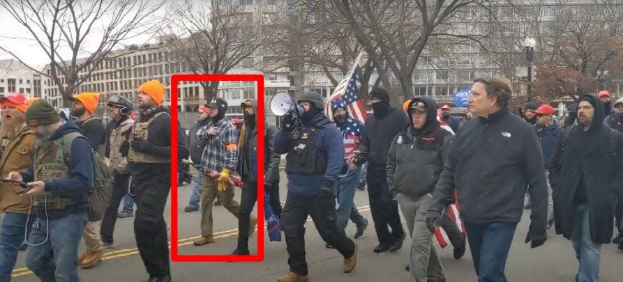 A federal complaint alleges that Arizona resident Micajah Joel Jackson, highlighted in the red box, walked with a group of individuals led by Proud Boys organizer Joe Biggs, toward the U.S. Capitol on Jan. 6. Jackson said he walked with the Proud Boys that day but is not a member of the group.
