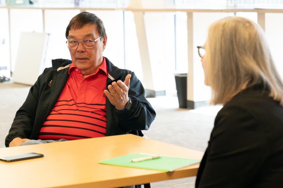 Shawnee County Treasurer Larry Mah points toward Democratic candidate Susan Duffy, who will be running for his position, as he talks with The Capital-Journal on Friday.
