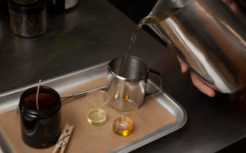 The table set-up for the candle making with the oils and pouring the wax - Credit: Rii Schroer