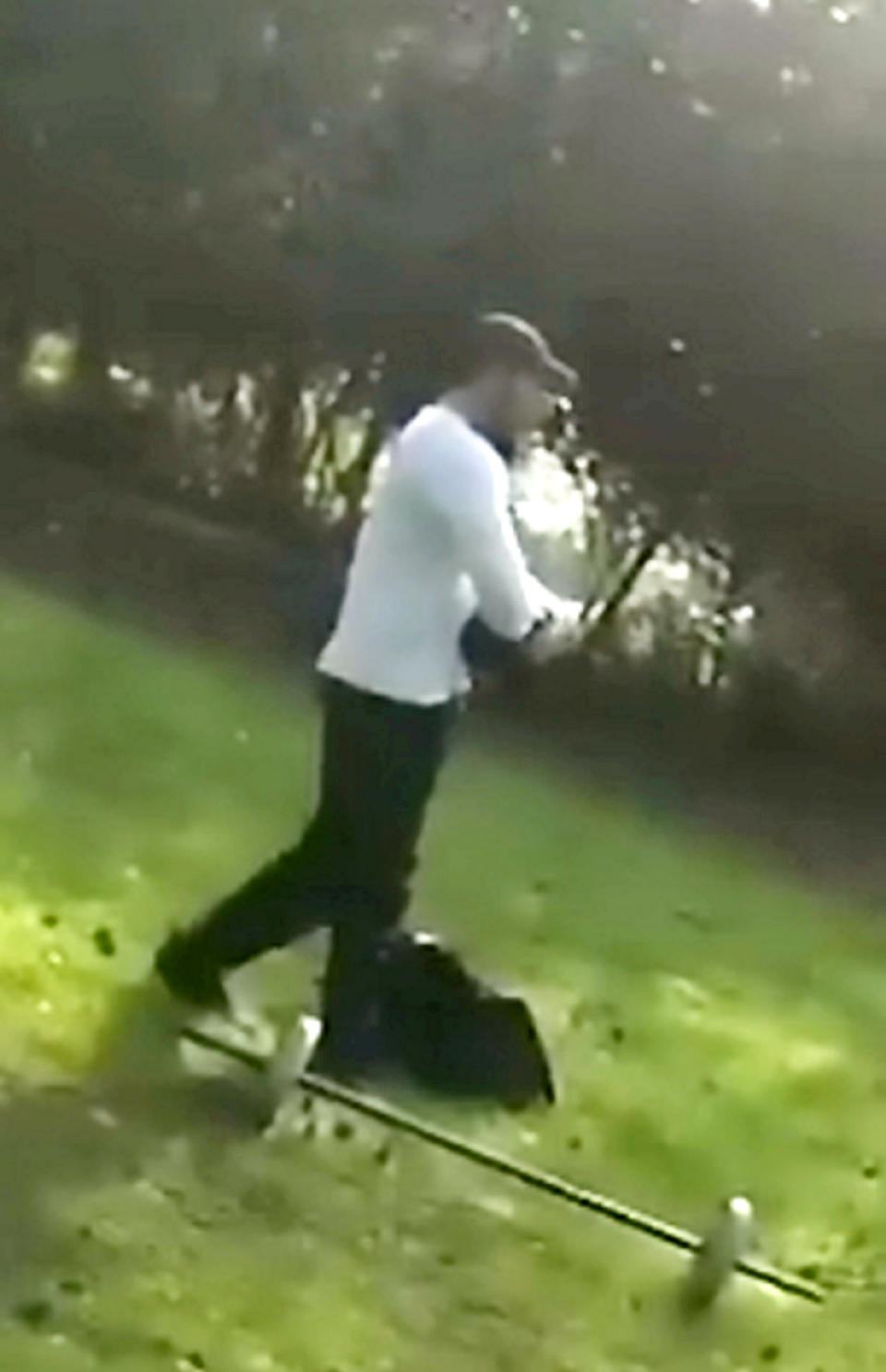 This man was caught sparring in a park with a pal, the pair had taken a bag full of gym equipment with them (SWNS)