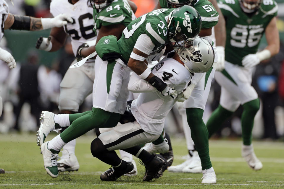 New York Jets strong safety Jamal Adams (33) sacks Oakland Raiders quarterback Derek Carr (4) during the first half of an NFL football game Sunday, Nov. 24, 2019, in East Rutherford, N.J. (AP Photo/Adam Hunger)