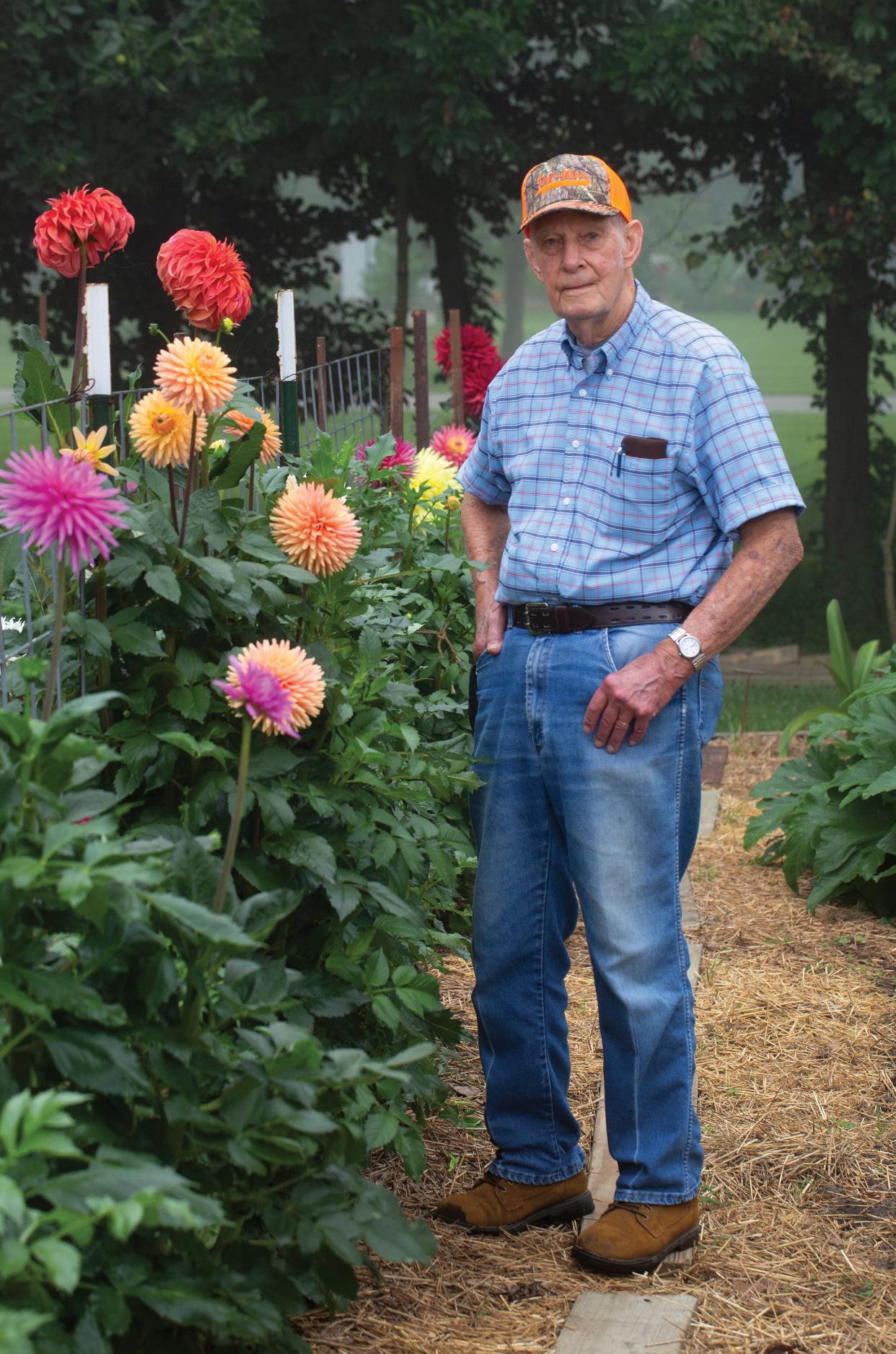 Dick Westfall with the 'April Dawn' dahlia