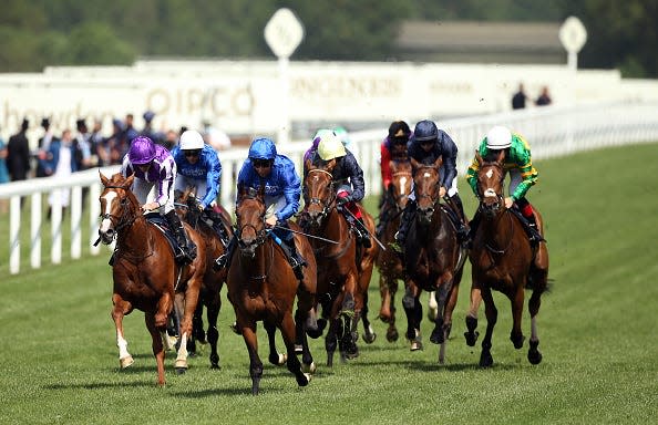 Kemari ridden by jockey William Buick (front centre) on their way to winning the Queen's Vase during day two of Royal Ascot at Ascot Racecourse.