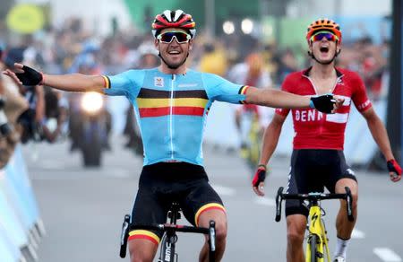 2016 Rio Olympics - Cycling Road - Final - Men's Road Race - Fort Copacabana - Rio de Janeiro, Brazil - 06/08/2016. Greg Van Avermaet (BEL) of Belgium celebrates as he crosses the finish line REUTERS/Matthew Childs