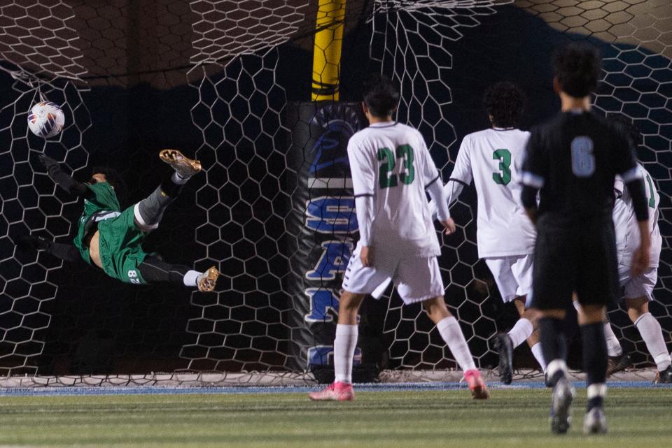 Victor Valley's goalkeeper Emmanuel Lopez leaps to block a shot during the first half on Saturday, March 5, 2023 at Phil Haley Stadium, in San Bernardino. San Gorgonio defeated Victor Valley 2-0 to capture the CIF SoCal Regional Division 5 championship.