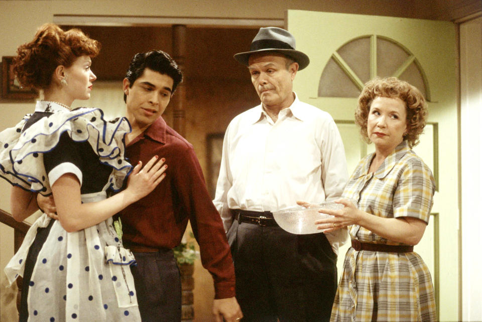 Laura Prepon as Lucy Ricardo, Wilmer Valderrama as Ricky Ricardo, Kurtwood Smith as Fred Mertz, & Debra Jo Rupp as Ethel Mertz from the episode 'Fez Dates Donna'