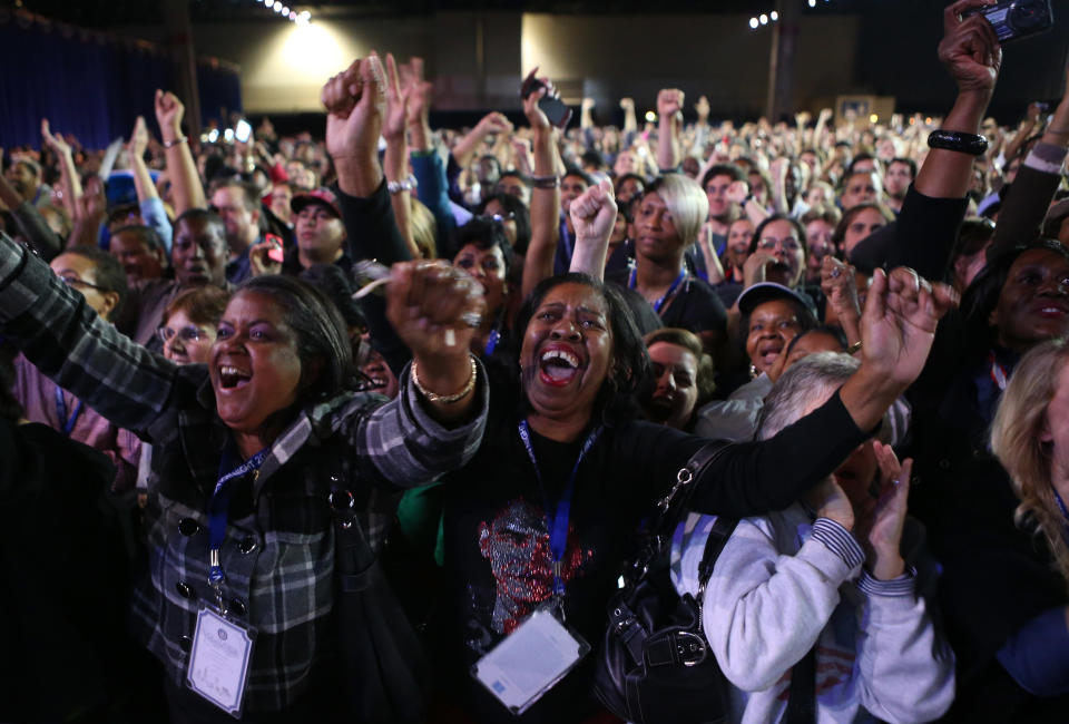 Supporters of U.S. President Barack Obama cheer during the Obama Election Night watch party at McCormick Place November 6, 2012 in Chicago, Illinois. Obama is going for reelection against Republican candidate, former Massachusetts Governor Mitt Romney. (Photo by Chip Somodevilla/Getty Images)