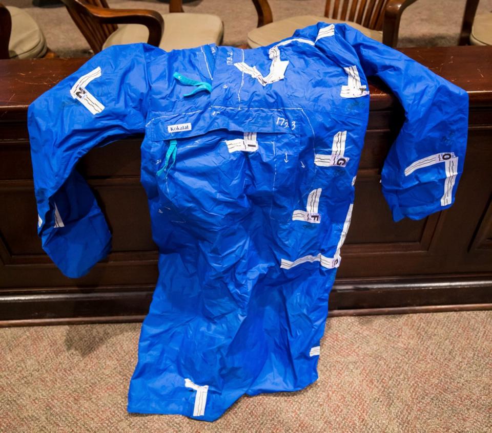 Blue raincoat shown in court (Jeff Blake Photo)