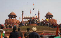 NEW DELHI, INDIA - 2021/01/26: Protesters gathering at the Red Fort during the demonstration. Thousands of farmers from Punjab and Haryana state continue to protest against the central government's new agricultural Laws. Delhi Police gave permission to protesting farmers' tractor parade on Republic Day. The parade started from Singhu, Tikri and Ghazipur borders points. (Photo by Naveen Sharma/SOPA Images/LightRocket via Getty Images)