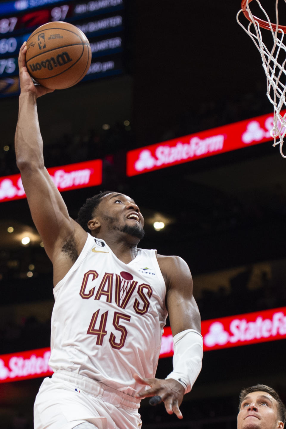 Cleveland Cavaliers guard Donovan Mitchell (45) dunks during the second half of an NBA basketball game against the Atlanta Hawks, Tuesday, March 28, 2023, in Atlanta. (AP Photo/Hakim Wright Sr.)