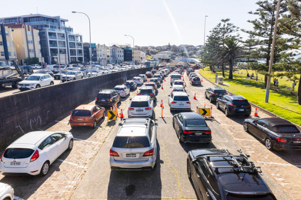 Long lines of cars are seen at the COVID-19 testing clinic at Bondi Beach in Sydney, Australia. 