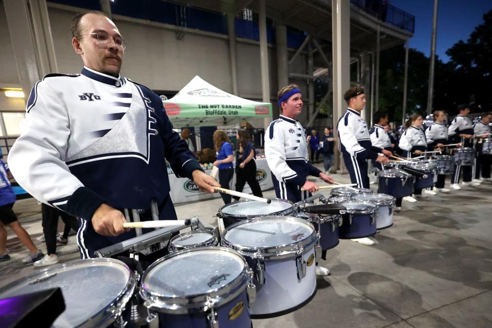 Drummers perform before the Brigham Young Cougars play the Cincinnati Bearcats at LaVell Edwards Stadium in Provo on Friday, Sept. 29, 2023. | Kristin Murphy, Deseret News