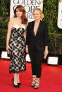 Golden Globes 2013: Amy Poehler and Tina Fey - the evening's hosts donned matching monochrome for the event © Getty