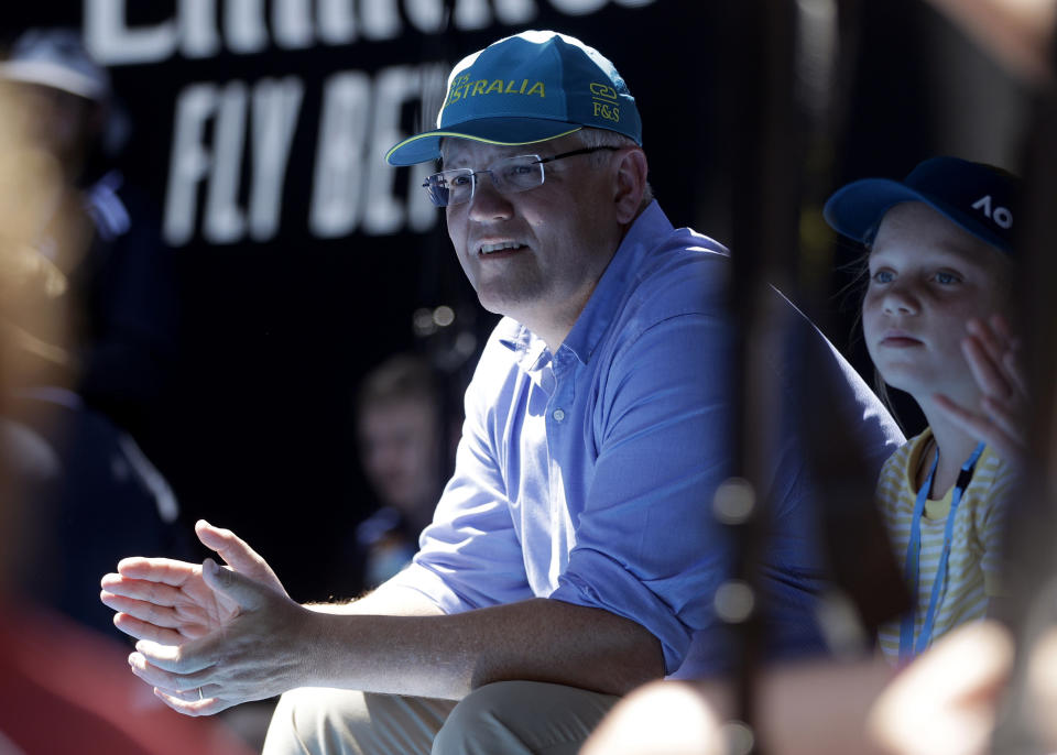 FILE - In this Jan 20, 2019, file photo, Australian Prime Minister Scott Morrison watches the fourth round match between Australia's Ashleigh Barty and Russia's Maria Sharapova on Rod Laver Arena at the Australian Open tennis championships in Melbourne, Australia. Saturday, May 18, 2019 is the last possible date that Morrison could have realistically chosen to hold an election. (AP Photo/Mark Schiefelbein, File)
