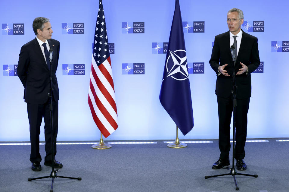 NATO Secretary General Jens Stoltenberg, right, and United States Secretary of State Antony Blinken participate in a media conference at NATO headquarters in Brussels, Wednesday, April 14, 2021. United States Secretary of State Antony Blinken is in Brussels on Wednesday for talks with European and NATO allies about Afghanistan, Ukraine and other matters. (Kenzo Tribouillard, Pool via AP)