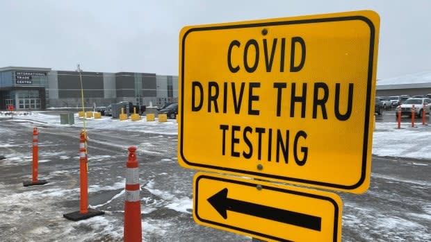 As of April 14, the Regina drive-thru vaccination clinic at Evraz Place on the Regina Exhibition grounds was open to people aged 48 to 54 only, on a first-come, first-served basis.  (Matthew Howard/CBC - image credit)