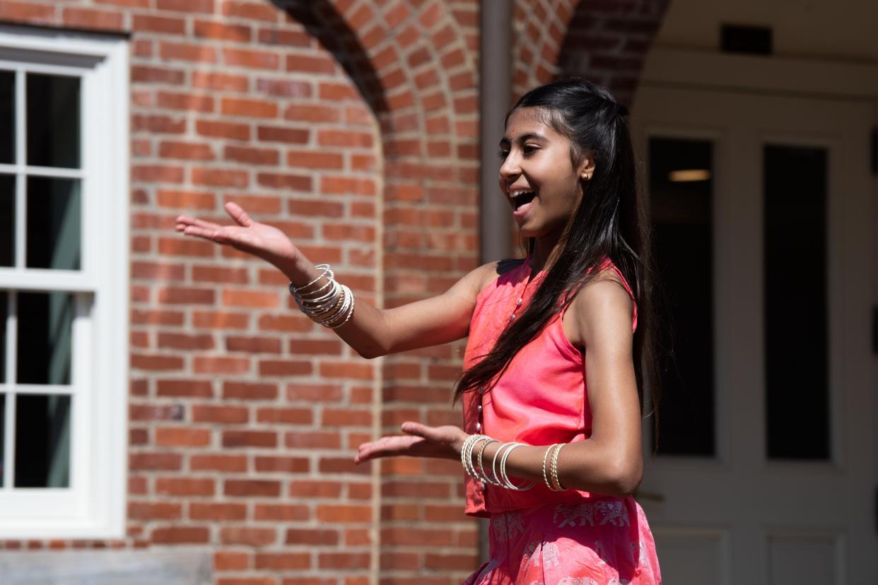 Raina Patel, 11, performs with the Dangling Divas during the annual Holi Festival of Colors hosted at the Cheekwood Garden & Estate in Nashville, Tenn., Saturday, March 23, 2024.