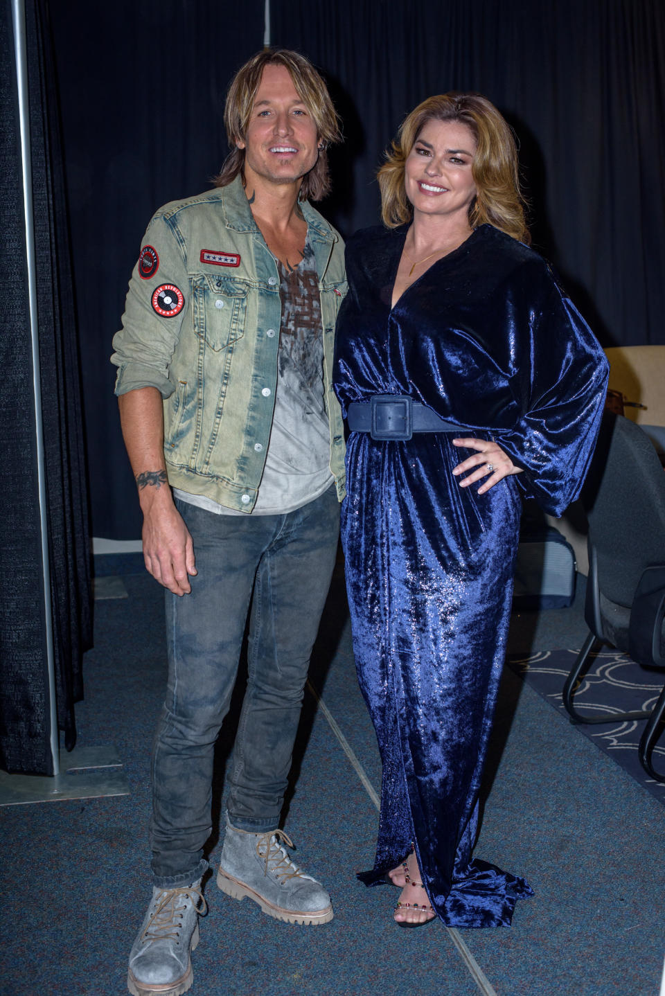 Twain wore a belted velvet number while presenting (and posing with Keith Urban). <i>(Getty Images)</i>