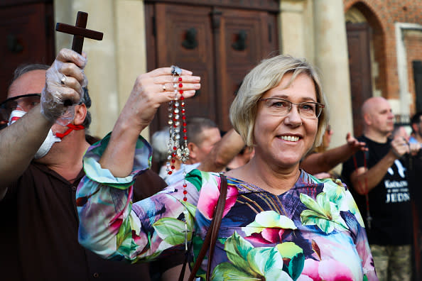 Barbara Nowak, the education superintendent in the Malopolska voivodeship, prays the rosary in front of St Mary's Basilica during an anti-LGBT gathering at the Main Square in Krakow, Poland.