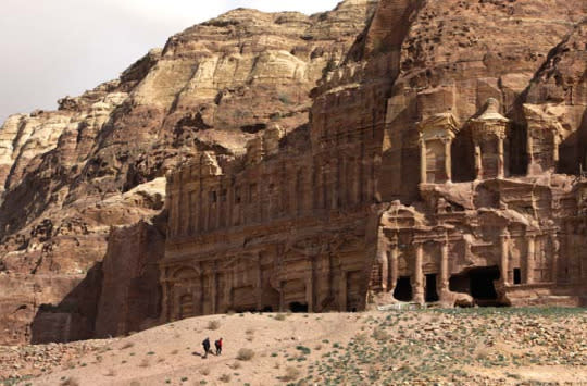 PETRA The ancient Nabataeans carved this incredible city into the sandstone cliffs between the Red Sea and the Dead Sea. Petra was lost until 1812, when Swiss explorer Johann Ludwig Burckhardt rediscovered it, and only 15 percent of the site has actually been unearthed. What we can see today includes 800 tombs, luxurious temples, churches, and the treasury—Petra’s most famous monument. Enter the archeological site through the Siq, a narrow canyon you might recognize from Indiana Jones and the Last Crusade. Insider Tip: The Petra by Night candlelit walk is a magical way to immerse yourself in the city’s mysterious glory. (Photo: Iv Nikolny/Shutterstock)