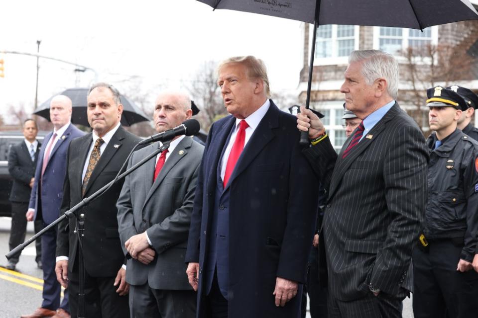 Former President Donald Trump stopped by the wake on Thursday. Dennis A. Clark