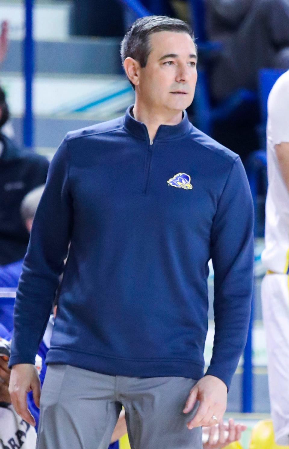 Delaware head coach Martin Ingelsby watches his team in the second half of the Blue Hens' 80-53 win against William and Mary at the Bob Carpenter Center, Thursday, Jan. 19, 2023.