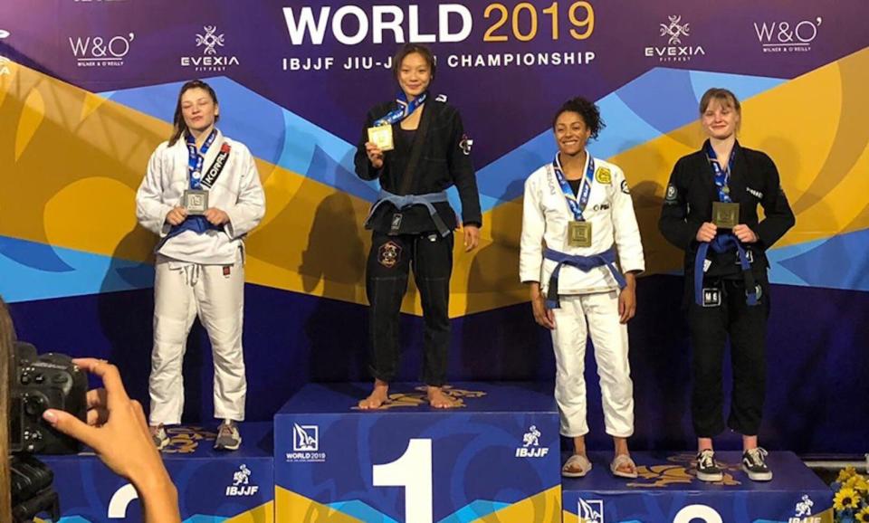 Singapore's jiu-jitsu exponent Constance Lien stands on the podium upon winning the blue-belt adult featherweight world title at the World IBJJF Jiu-Jitsu Championships in Long Beach, California. (PHOTO: Constance Lien/Team Singapore)