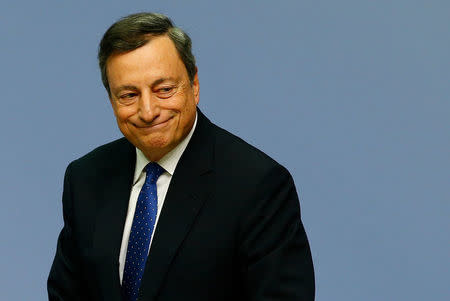 FILE PHOTO - European Central Bank (ECB) President Mario Draghi walks after a news conference at the ECB headquarters in Frankfurt, Germany, December 8, 2016. REUTERS/Ralph Orlowski/File Photo