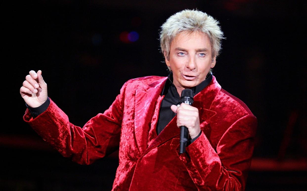 Barry Manilow performs at the Las Vegas Hilton in 2005 - Getty