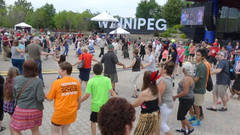 At the heart of Indigenous Day Live, a knowledge keeper stokes the sacred fire