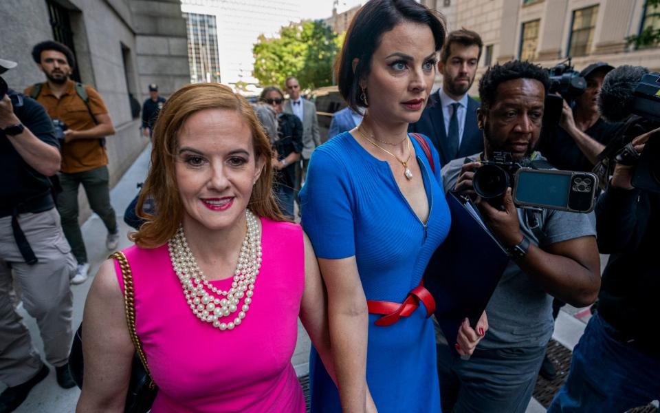 Elizabeth Stein, left, with Sarah Ransome this morning - AP Photo/John Minchillo